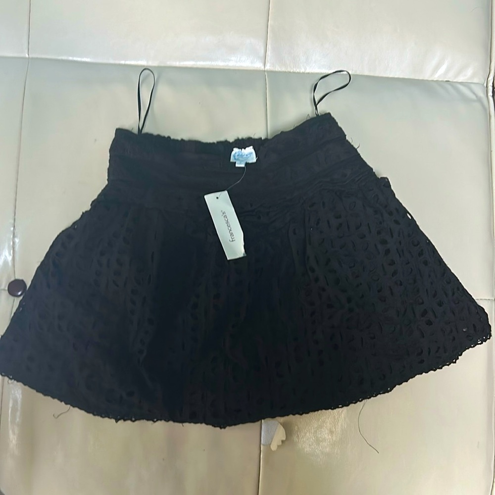 NWT Francesca’s black eyelet mini-skort. Made in India. Size S.